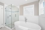 Relax in the free-standing soaking tub or spacious shower.